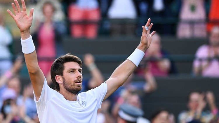 Cam Norrie celebrating winning match point during his semi-final clash against David Goffin at the 2022 Championships Wimbledon