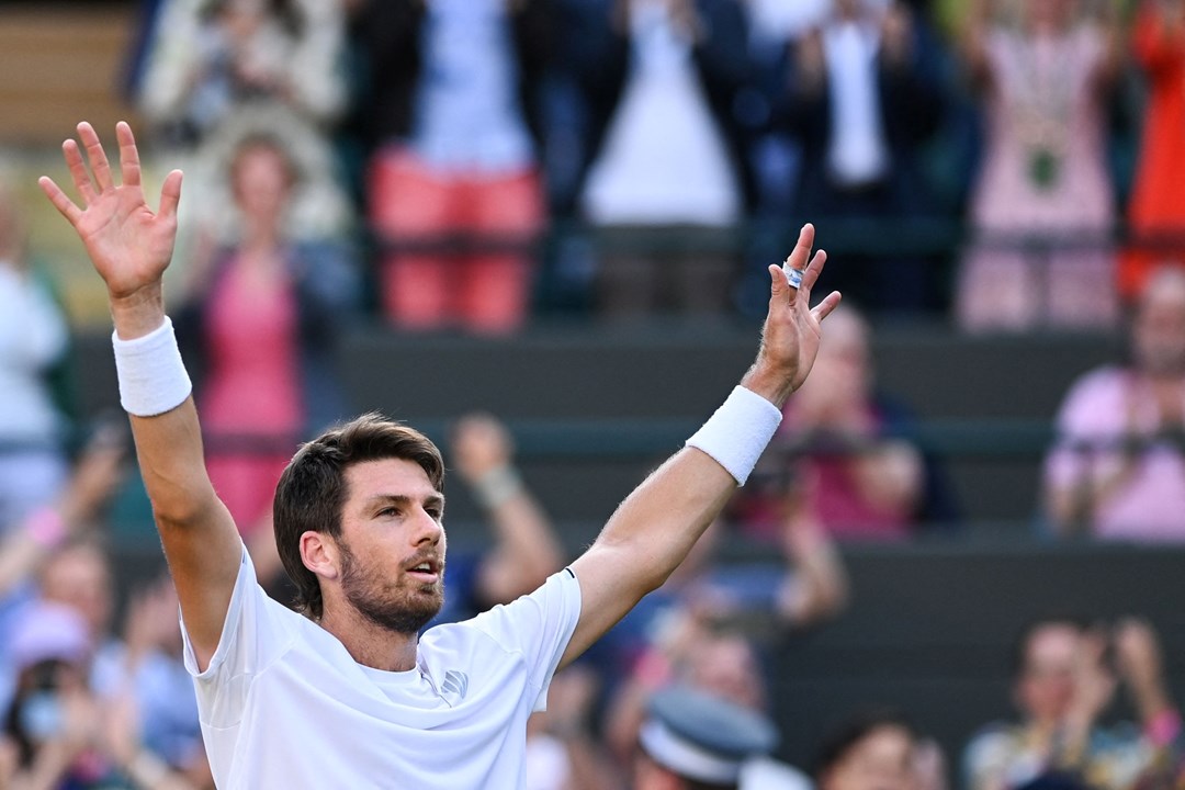 Cam Norrie celebrating winning match point during his semi-final clash against David Goffin at the 2022 Championships Wimbledon