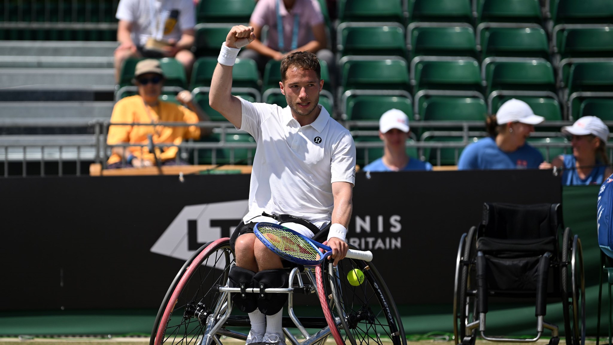 Alfie Hewett raises a fist in celebration after winning the Lexus British Open final