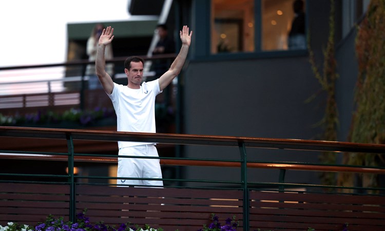 Andy Murray waves to the crowds at Wimbledon