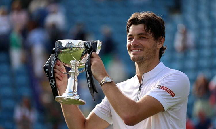 Taylor Fritz holding the Lexus Eastbourne Open trophy in 2025