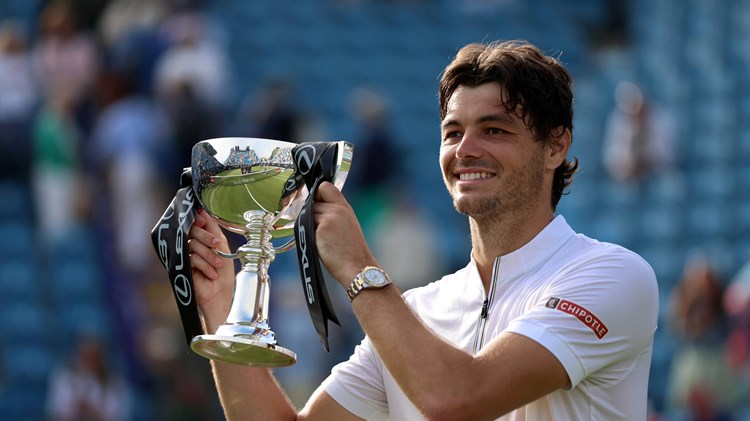 Taylor Fritz holding the Lexus Eastbourne Open trophy in 2025