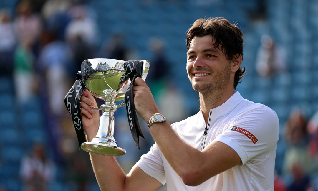 Taylor Fritz holding the Lexus Eastbourne Open trophy in 2025