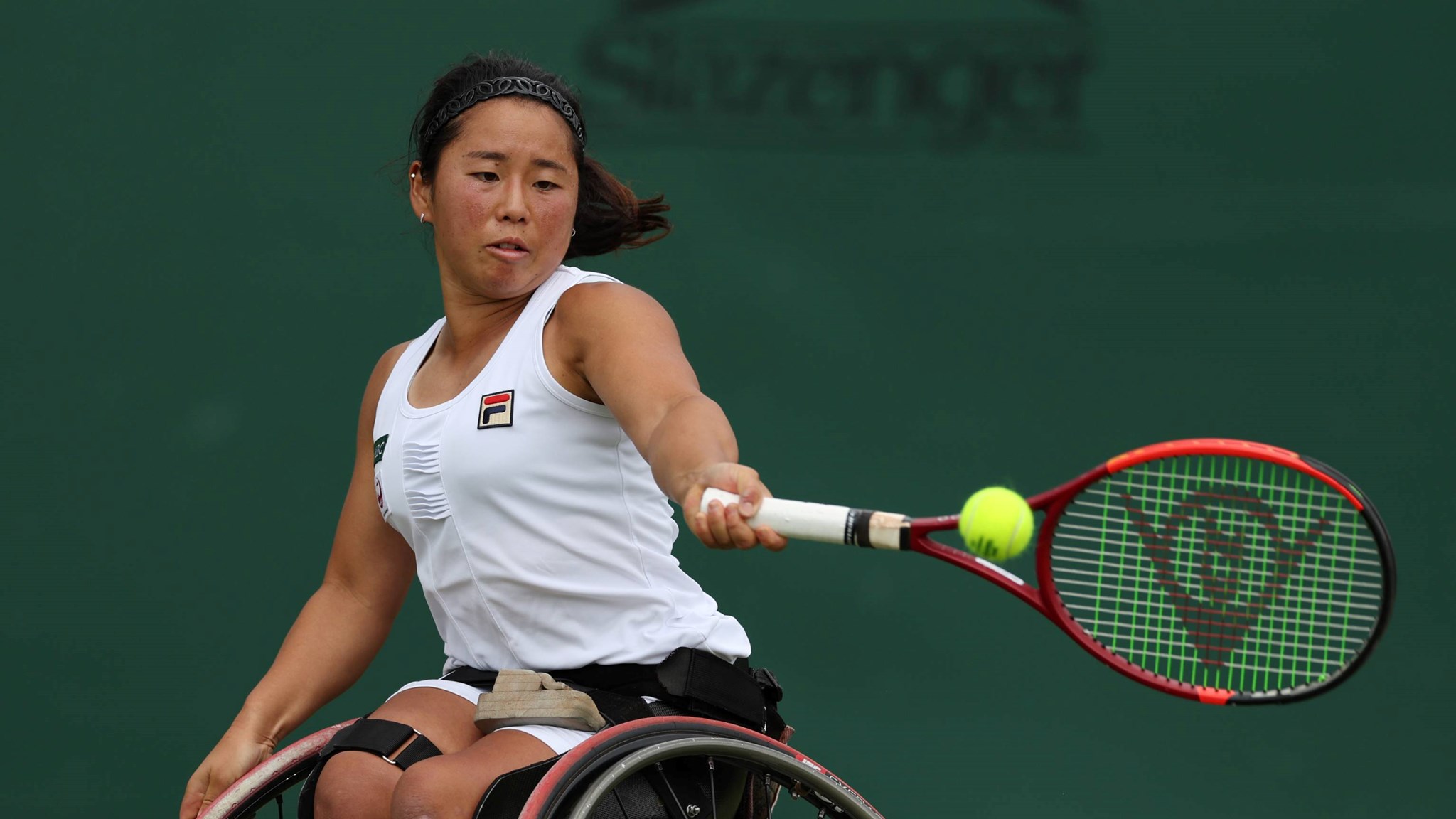 Japan's Yui Kamiji hitting a forehand at the Lexus British Open Roehampton