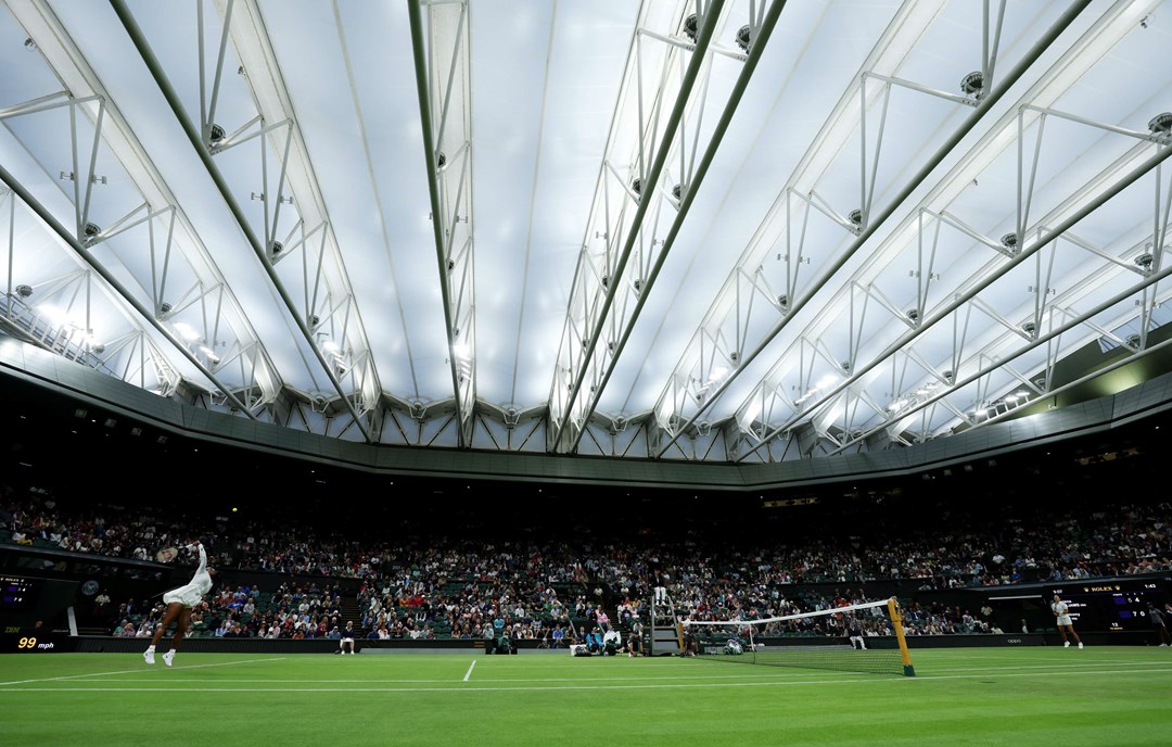 General view of Centre Court with the roof closed during Serena Williams and Harmony Tan's first round match on day two of Wimbledon