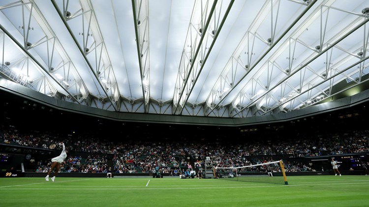 General view of Centre Court with the roof closed during Serena Williams and Harmony Tan's first round match on day two of Wimbledon