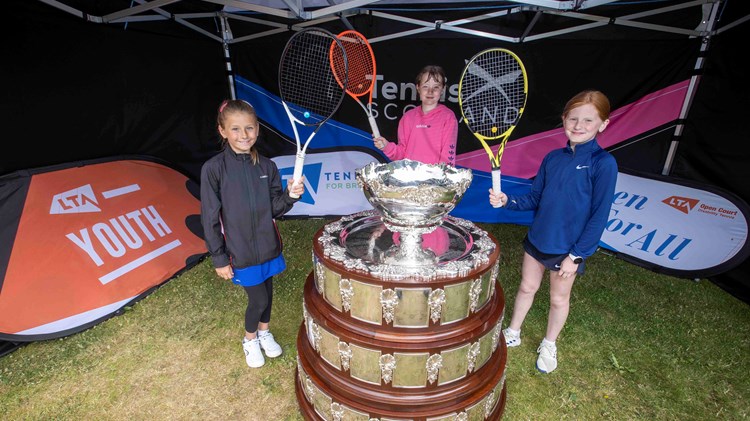 Craiglockhart tennis players with the Davis Cup trophy