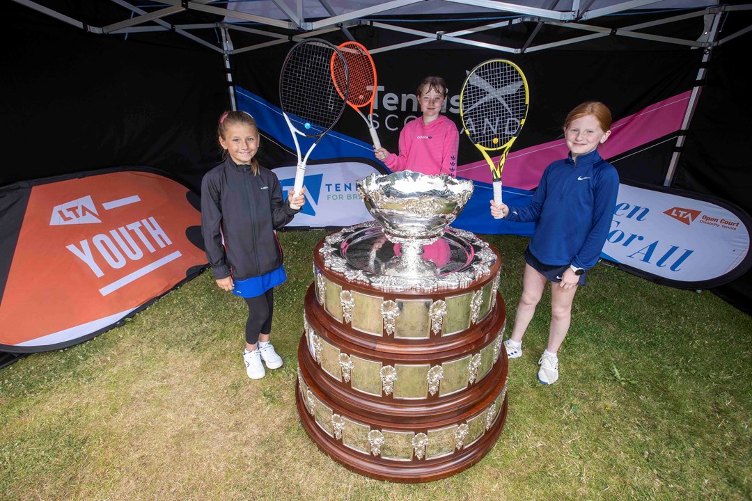 Craiglockhart tennis players with the Davis Cup trophy