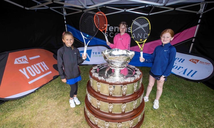 Craiglockhart tennis players with the Davis Cup trophy