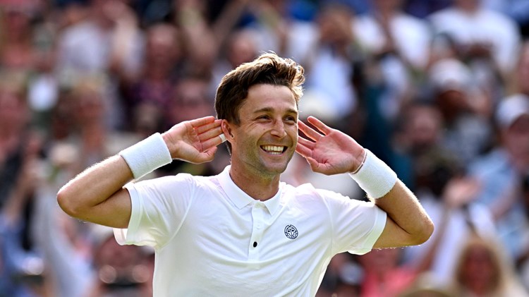Liam Broady celebrates reaching the third round at Wimbledon with win over fourth seed Casper Ruud