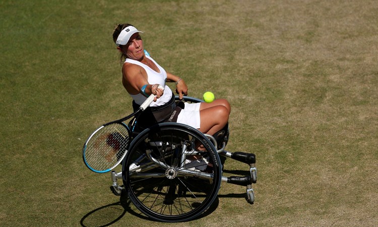 Lucy Shuker in action during the semi-finals of the Women's Singles Wheelchair semi-finals at the 2022 Championships Wimbledon