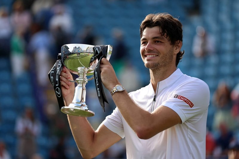 Taylor Fritz holding the Lexus Eastbourne Open trophy in 2025