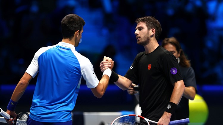 Cam Norrie and Novak Djokovic shake hands at the Nitto ATP Finals