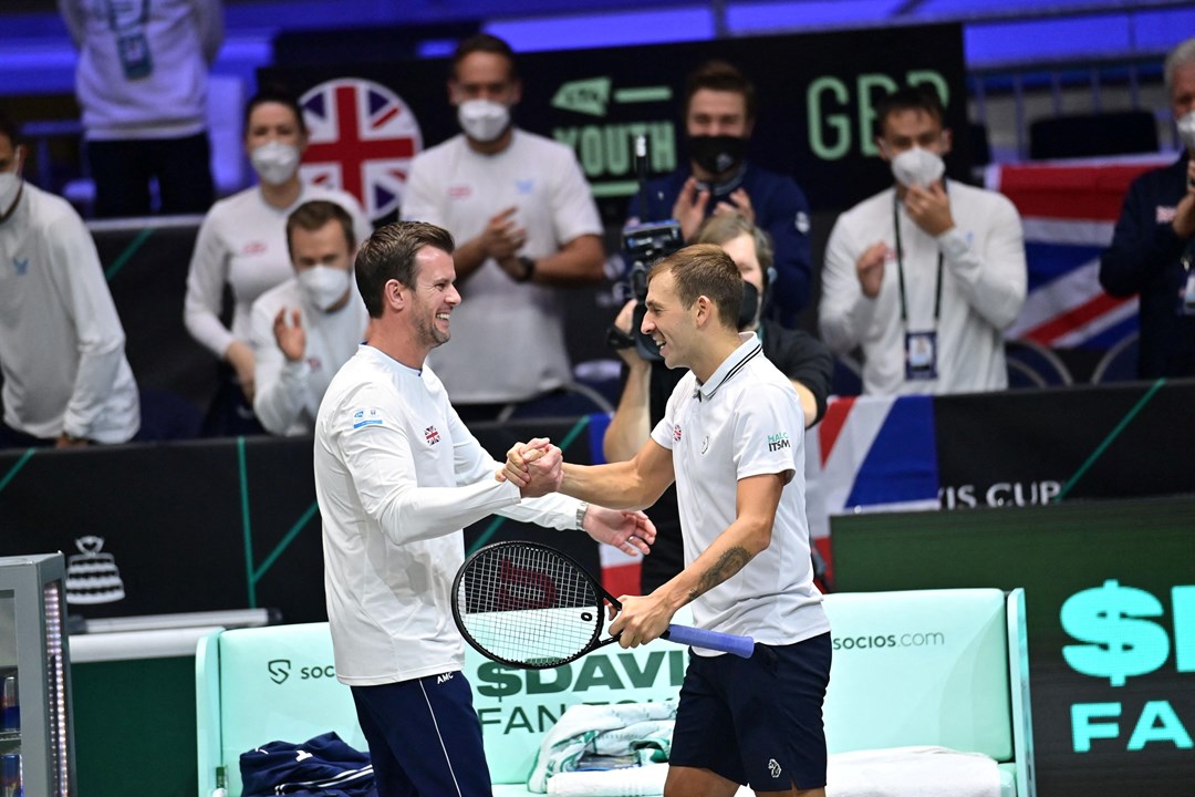 Leon Smith and Dan Evans high five at the Davis Cup Finals 2021