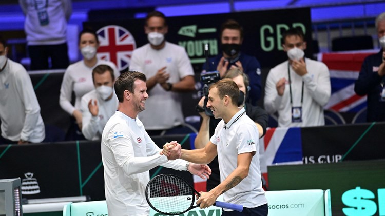 Leon Smith and Dan Evans high five at the Davis Cup Finals 2021
