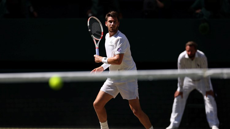 Cam Norrie hits a forehand in the Wimbledon semi-final
