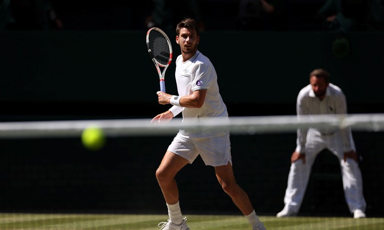 Cam Norrie hits a forehand in the Wimbledon semi-final