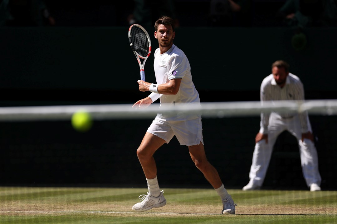 Cam Norrie hits a forehand in the Wimbledon semi-final