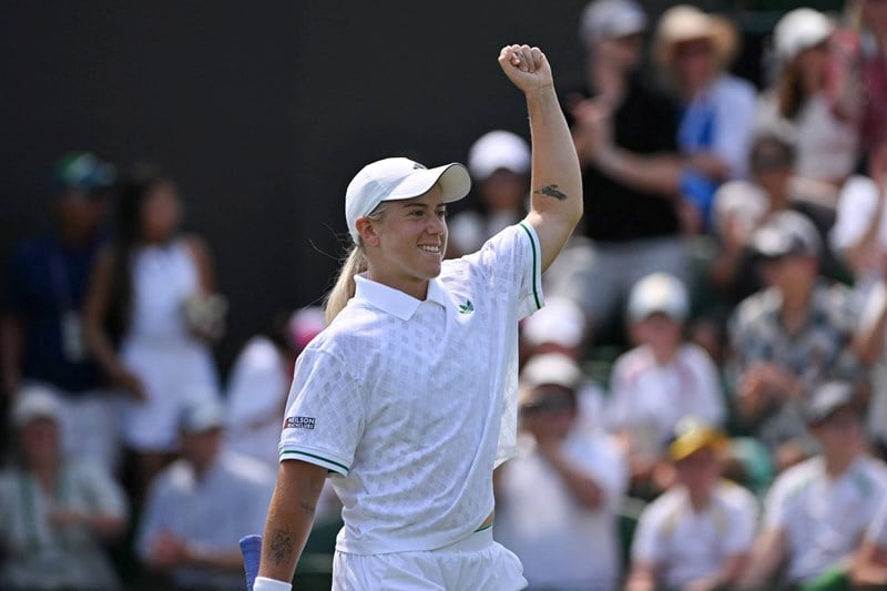 Sonay Kartal pumps her fist in celebration after beating Jelena Ostapenko at Wimbledon