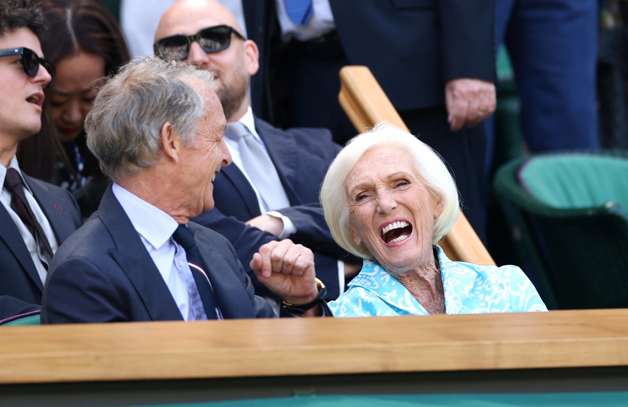 Mary Berry laughing from the Royal Box on Wimbledon's Centre Court