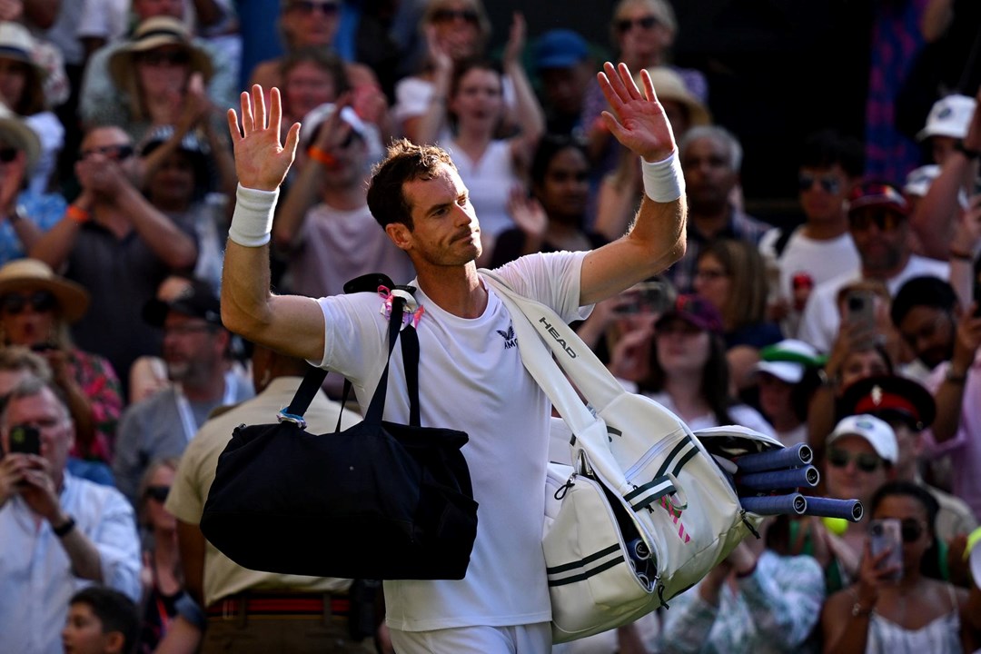 Andy Murray waves to the crowd after losing to Stefanos Tsitsipas at Wimbledon