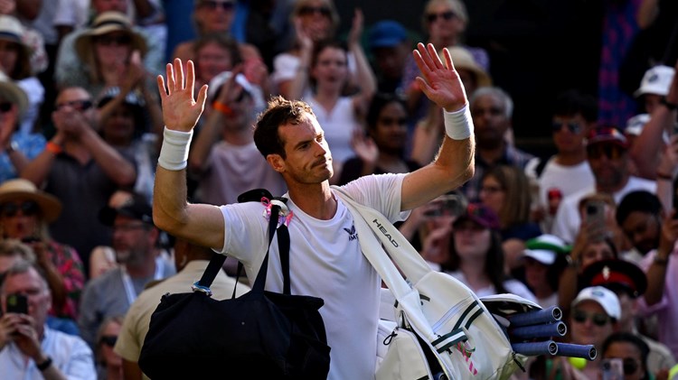 Andy Murray waves to the crowd after losing to Stefanos Tsitsipas at Wimbledon