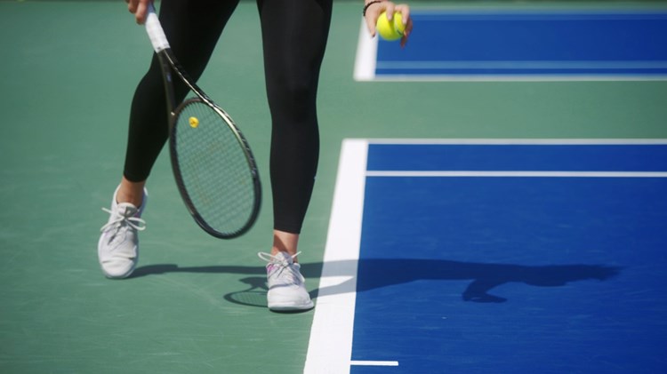 General shot of a player serving