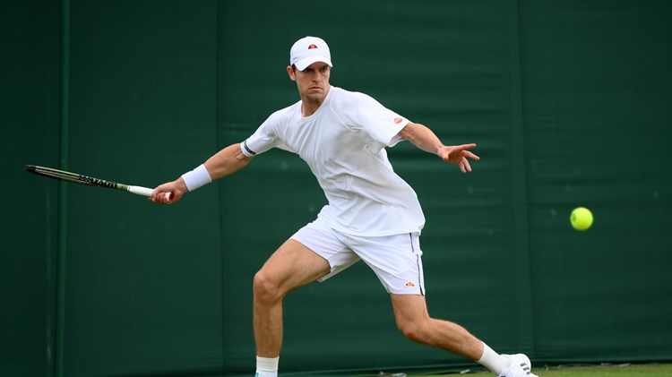 Alastair Gray in action during his second round match against Taylor Fritz at Wimbledon 2022