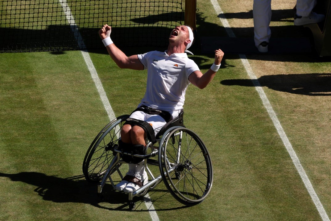 Alfie Hewett celebrates match point against Gustavo Fernandez during the Wheelchair Singles Semi Final match on day twelve of The Championships Wimbledon 2022