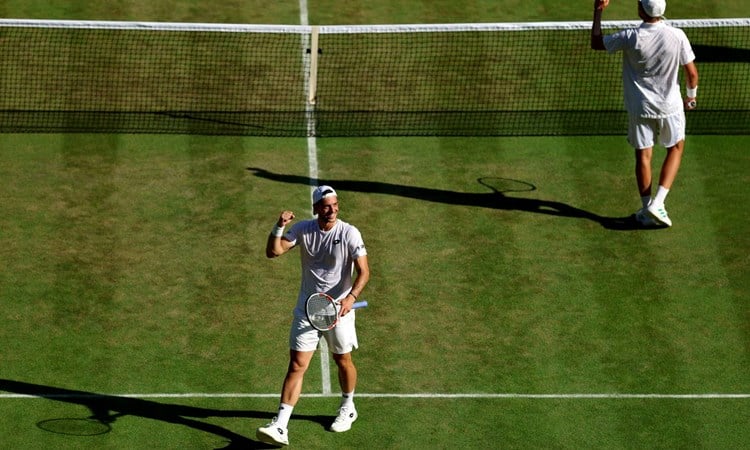 Julian Cash and Lloyd Glasspool celebrate reaching the final at Wimbledon 2025