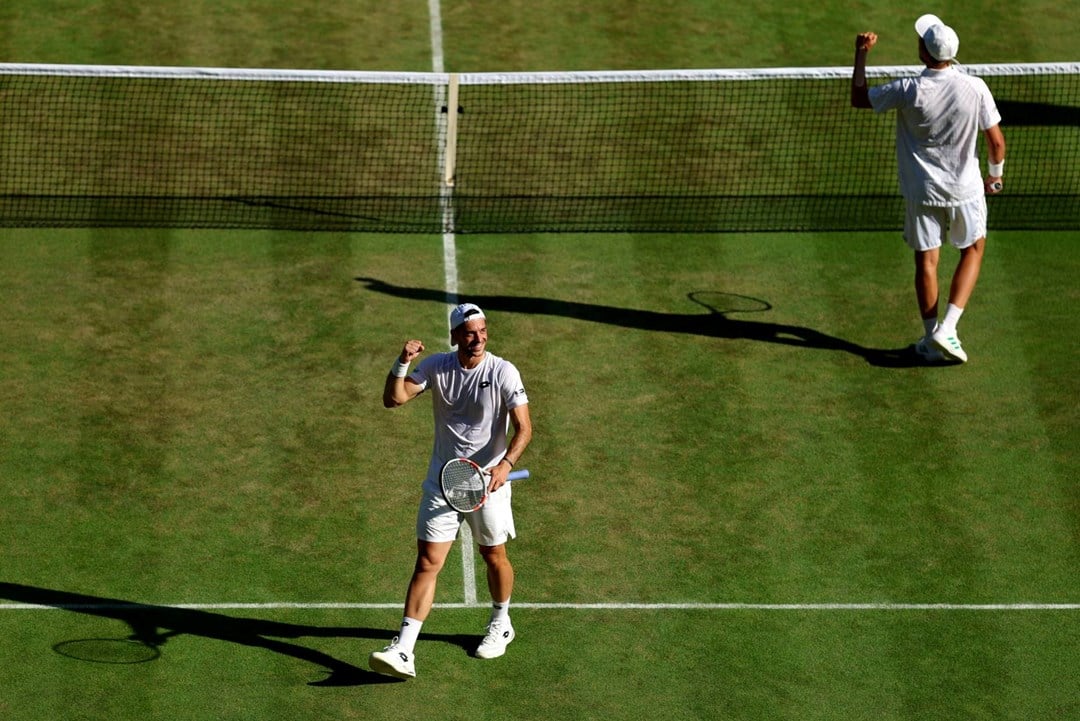 Julian Cash and Lloyd Glasspool celebrate reaching the final at Wimbledon 2025