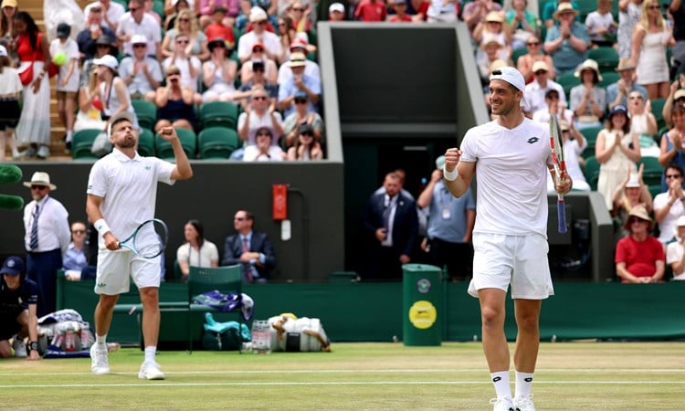 Lloyd Glasspool and Julian Cash celebrate reaching the semi-finals at Wimbledon