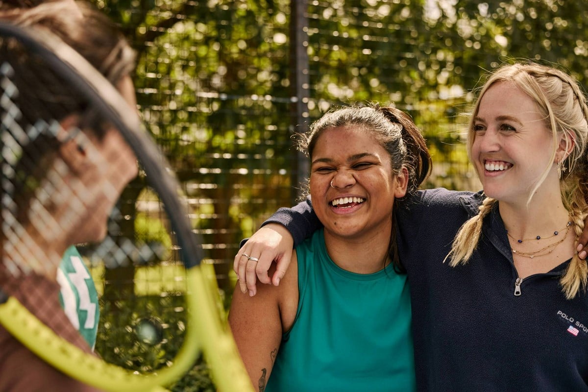 Women's-campaign-laughing-on-court.jpg