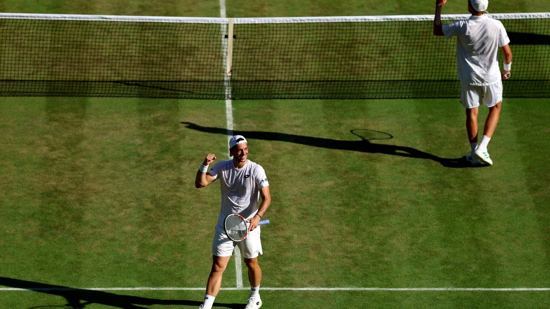 Julian Cash and Lloyd Glasspool celebrate reaching the final at Wimbledon 2025