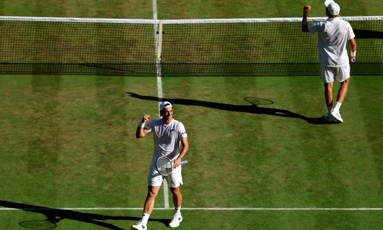 Julian Cash and Lloyd Glasspool celebrate reaching the final at Wimbledon 2025