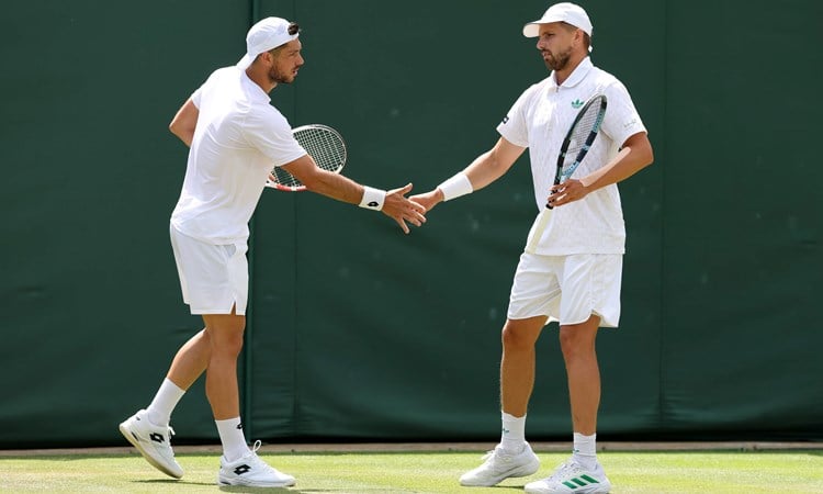 Wimbledon 2025: Julian Cash & Lloyd Glasspool beat defending champions to reach semi-finals