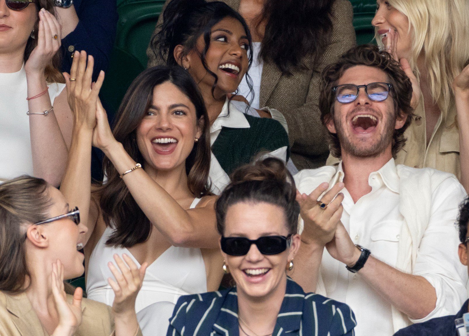 Andrew Garfield laughing in the stands at Wimbledon