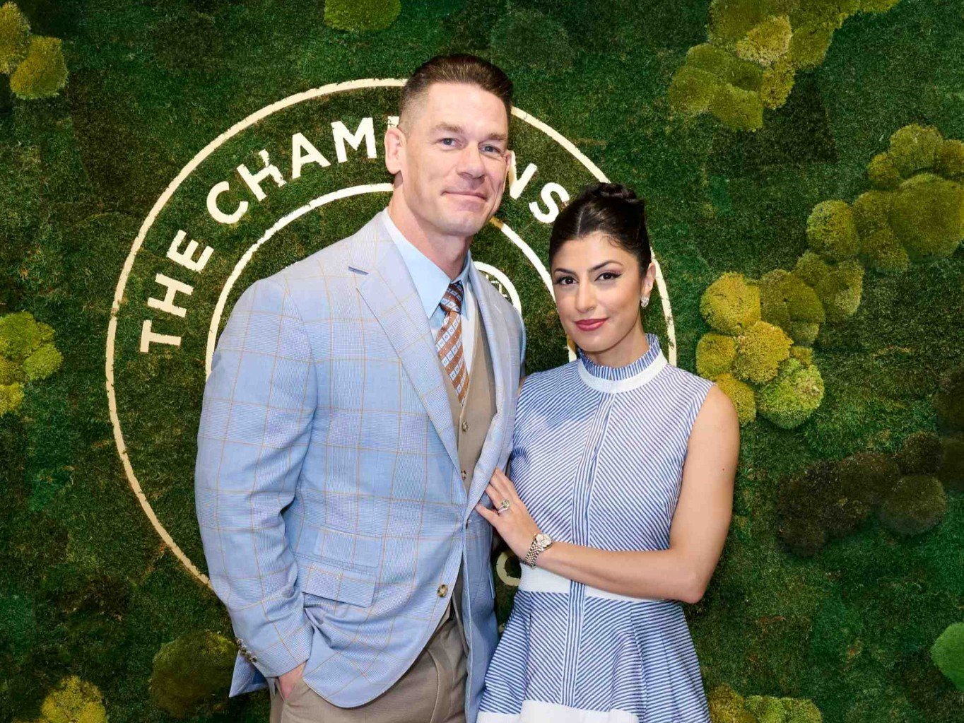 Wrestler and actor John Cena with his wife Shay Shariatzadeh at Wimbledon