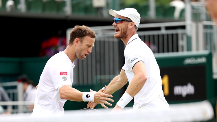 Jamie Murray of Great Britain and partner Michael Venus of New Zealand celebrate against Alexander Erler of Austria and Lucas Miedler of Austria in the Men's Doubles Second Round match during day seven of The Championships Wimbledon 2023 at All England Lawn Tennis and Croquet Club on July 09, 2023 in London, England. 