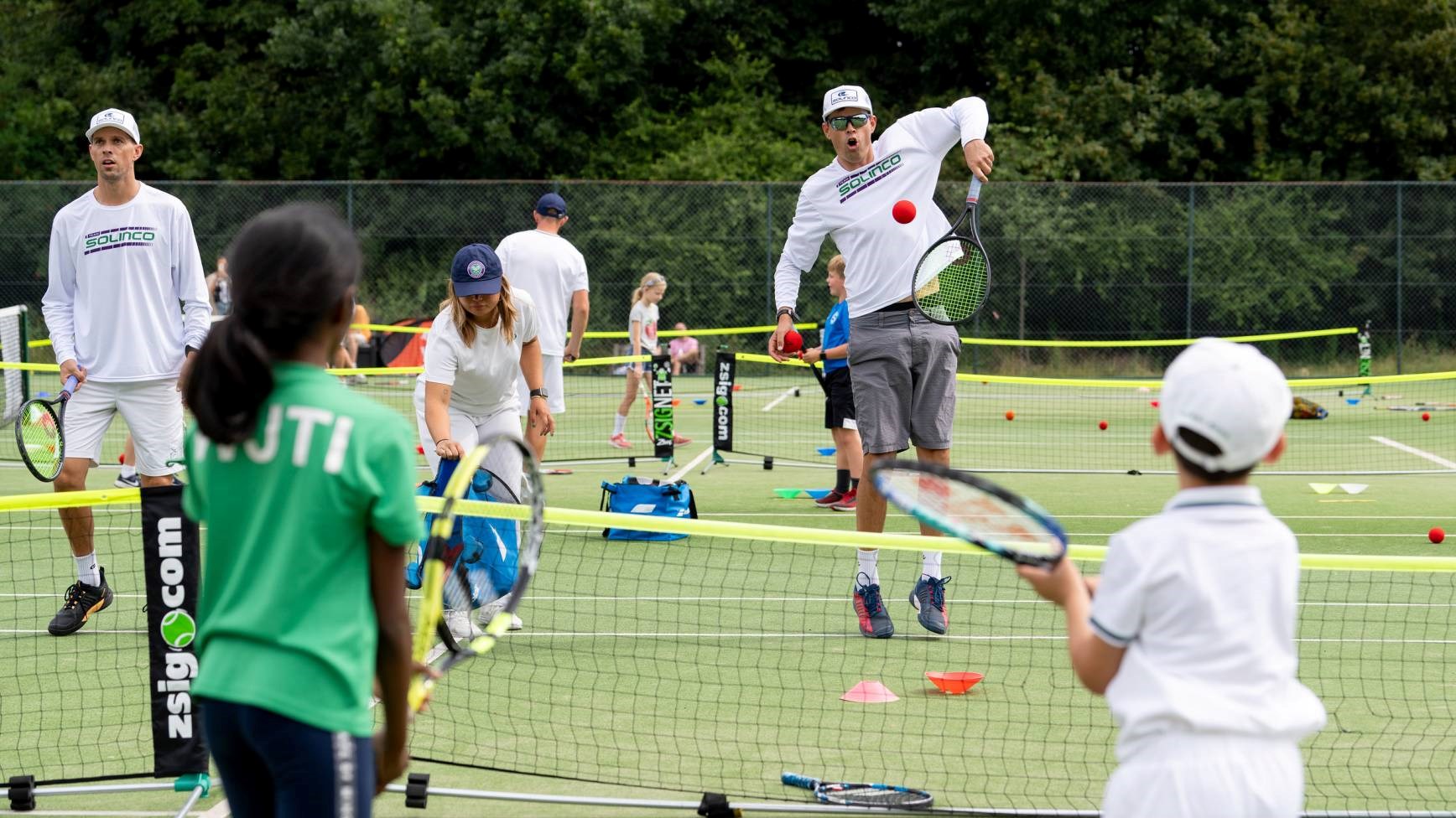 Bryan brothers playing tennis at Wimbledon Middle Saturday Opened Up