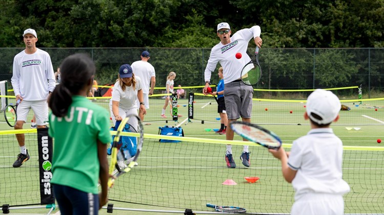 Bryan brothers playing tennis at Wimbledon Middle Saturday Opened Up