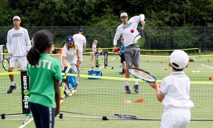 Bryan brothers playing tennis at Wimbledon Middle Saturday Opened Up