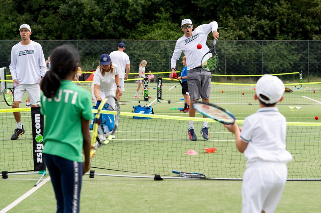 Bryan brothers playing tennis at Wimbledon Middle Saturday Opened Up