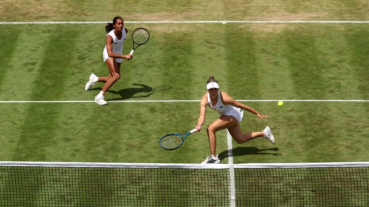 Naiktha Bains of Great Britain and Maia Lumsden of Great Britain celebrate winning match point against Viktoria Hruncakova of Slovakia and Tereza Mihalikova of Slovakia in the Women's Doubles Second Round match during day eight of The Championships Wimbledon 2023 at All England Lawn Tennis and Croquet Club on July 10, 2023 in London, England.