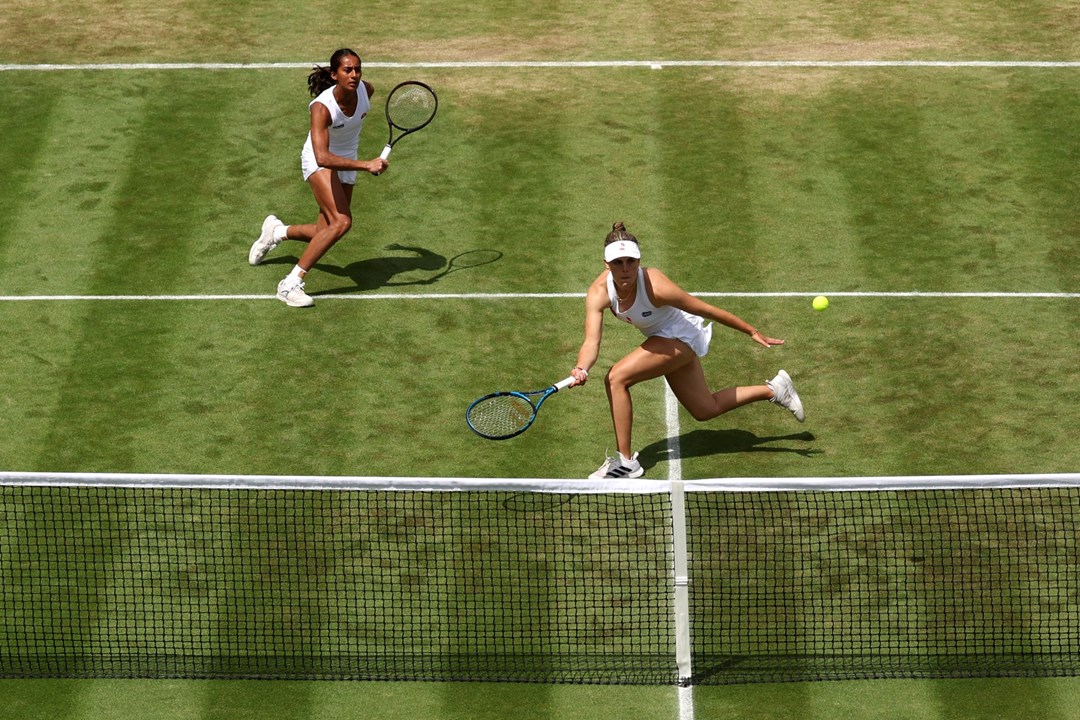 Naiktha Bains of Great Britain and Maia Lumsden of Great Britain celebrate winning match point against Viktoria Hruncakova of Slovakia and Tereza Mihalikova of Slovakia in the Women's Doubles Second Round match during day eight of The Championships Wimbledon 2023 at All England Lawn Tennis and Croquet Club on July 10, 2023 in London, England.