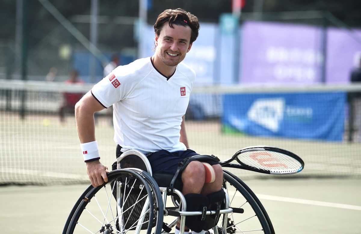 reid-smiles-after-victory-british-open-2022.jpg