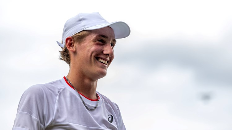 Henry Searle smiles after reaching the quarter-finals at Junior Wimbledon