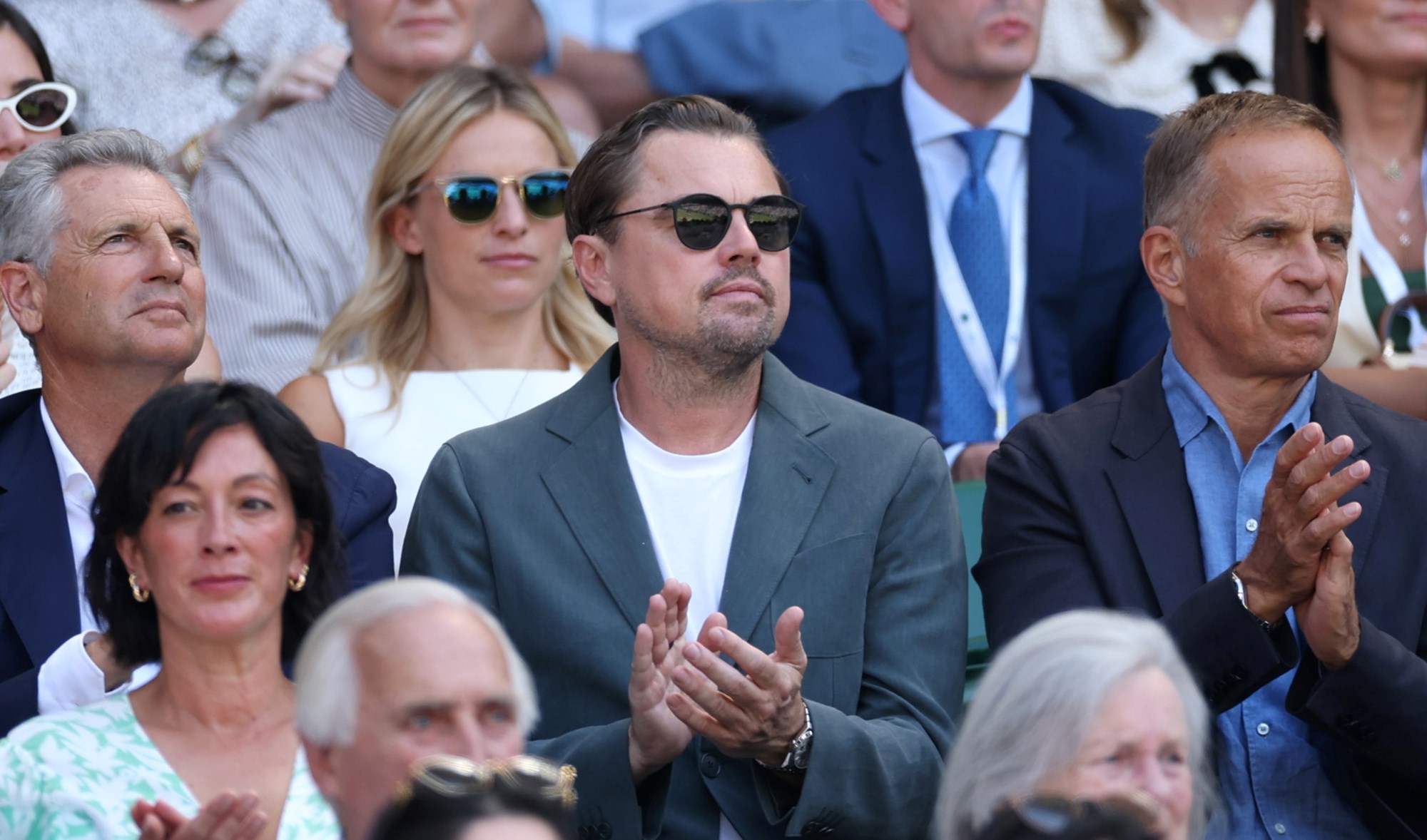 American actor Leonardo DiCaprio clapping from the Royal Box at Wimbledon