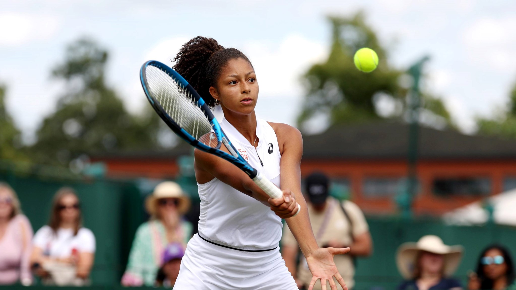 Britain's Ranah Stoiber hits a volley at Junior Wimbledon 2023