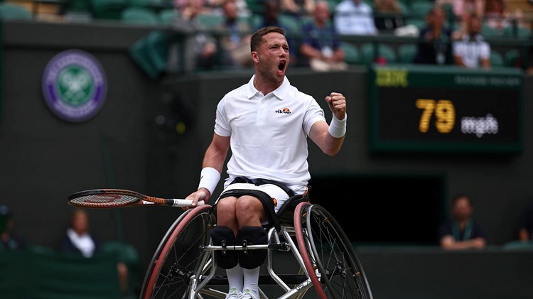 Alfie Hewett gives a roar in celebration during the wimbledon wheelchair men's singles final